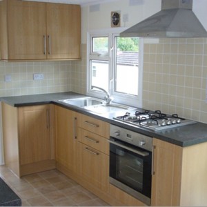 New kitchen in refurbished home at Merrywood Park, Box Hill, Surrey